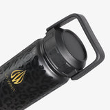 A close-up of a black insulated water bottle with a textured pattern, a black lid, and a matching durable carrying handle, featuring a gold logo and the brand name 'LA WIHA' on a light gray background.