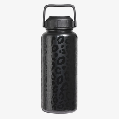 A leopard print insulated water bottle with a textured leopard print pattern and a black carrying handle lid, shown on a solid white background. 

Stainless steel, durable, insulation, water bottle, water bottles, water jug, best water bottle, 32oz insulated water bottle perfect water bottle
